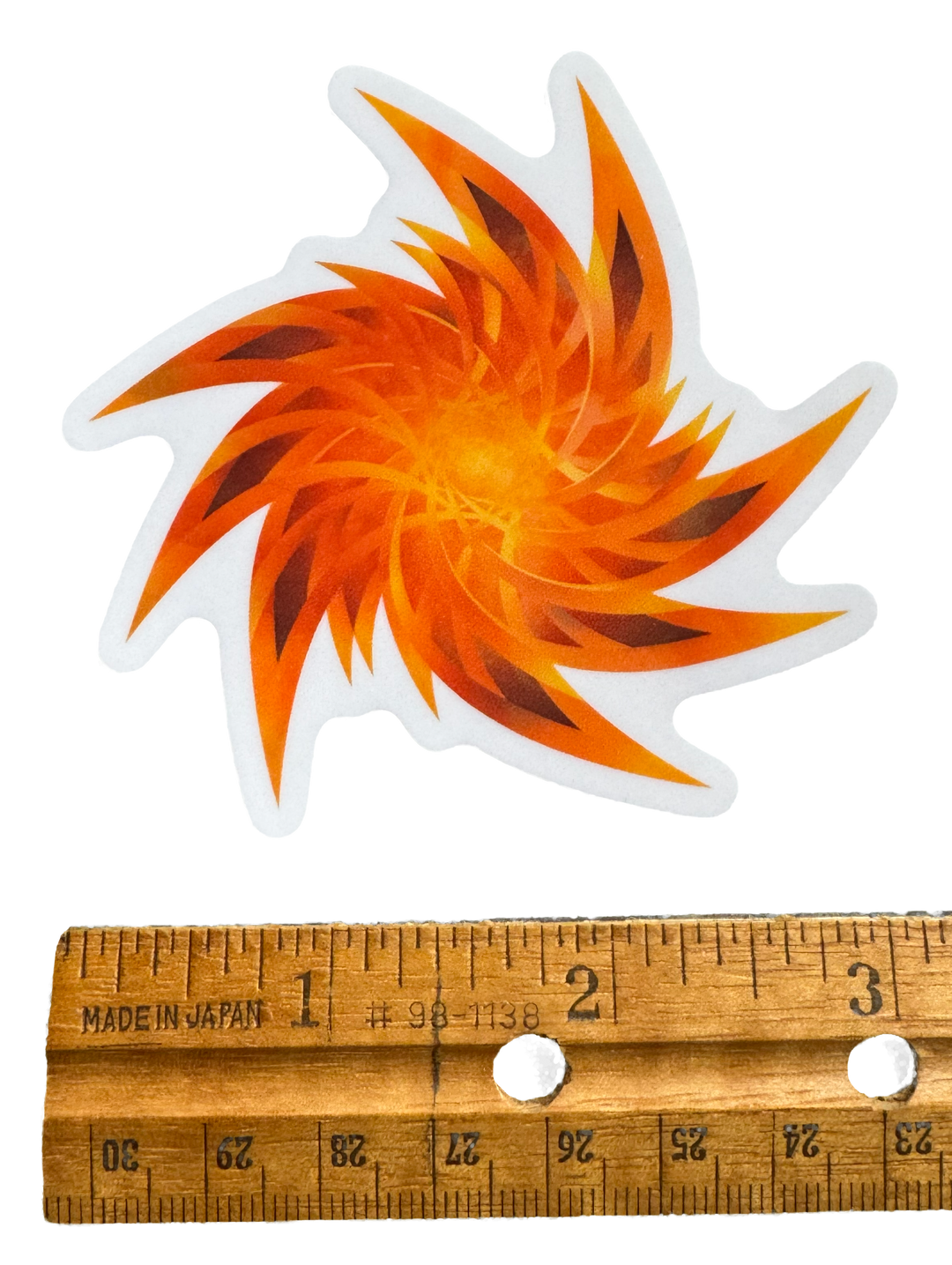 Crisp geometric fire-toned artwork with a smooth, glossy finish that keeps every angle sharp and every color blazing bright with ruler for size validity