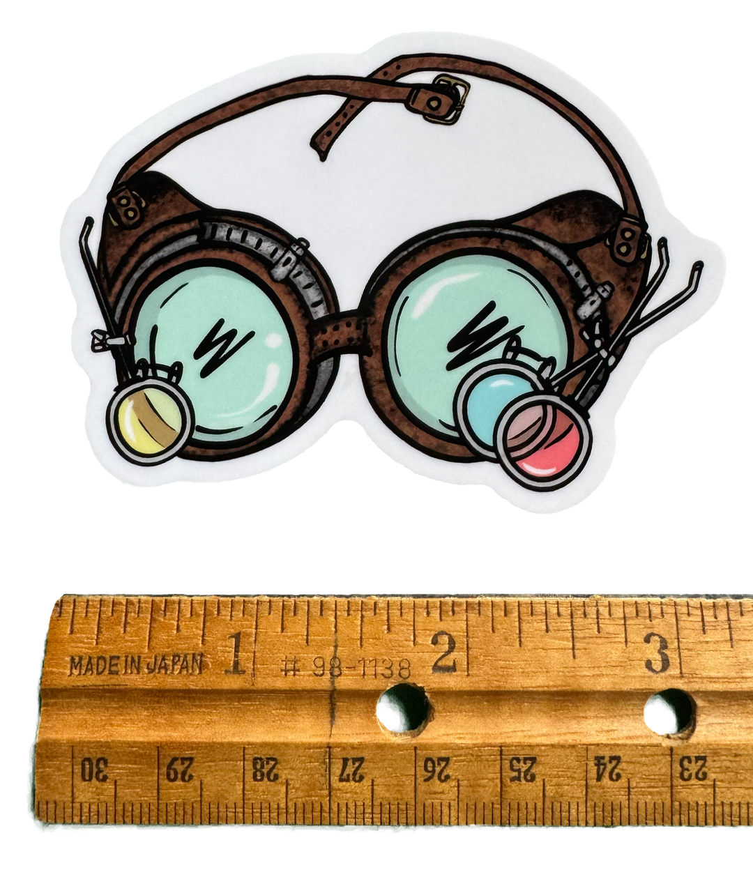 This DND sticker is inspired by brilliant tinkerers. The Artificer Goggles sticker brings charm and magical workshop vibes wherever it takes hold. with a ruler for size validity. 