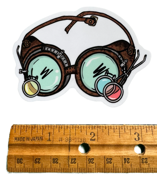 This DND sticker is inspired by brilliant tinkerers. The Artificer Goggles sticker brings charm and magical workshop vibes wherever it takes hold. with a ruler for size validity. 