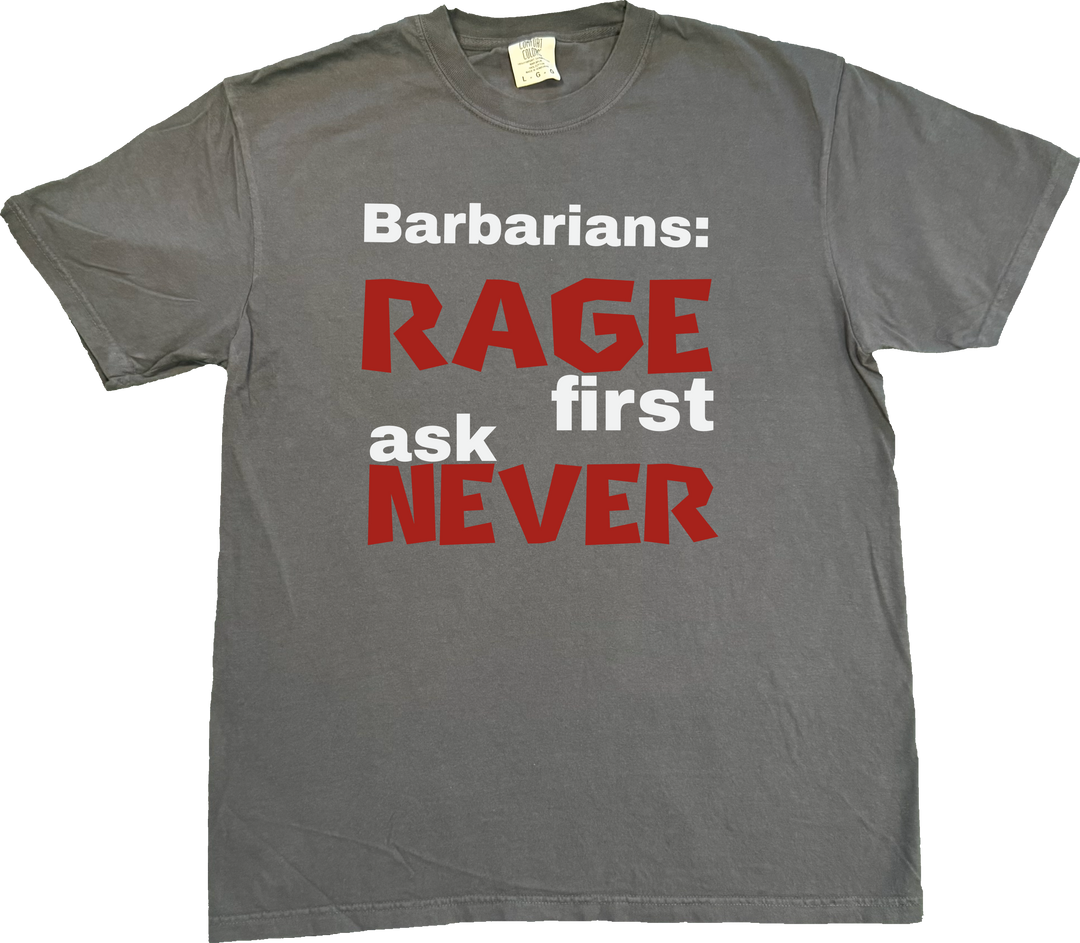 Barbarian D&D t-shirt featuring the bold phrase 'Rage First, Ask Later' in a rugged, adventure-inspired style. on a Dark Grey (Graphite) Comfort Colors T-shirt.