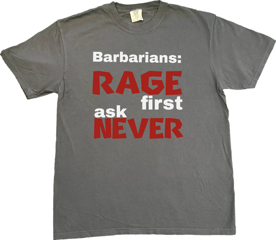 Barbarian D&D t-shirt featuring the bold phrase 'Rage First, Ask Later' in a rugged, adventure-inspired style. on a Dark Grey (Graphite) Comfort Colors T-shirt.